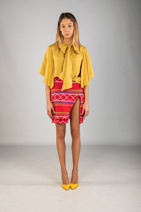 red skirt and yellow top