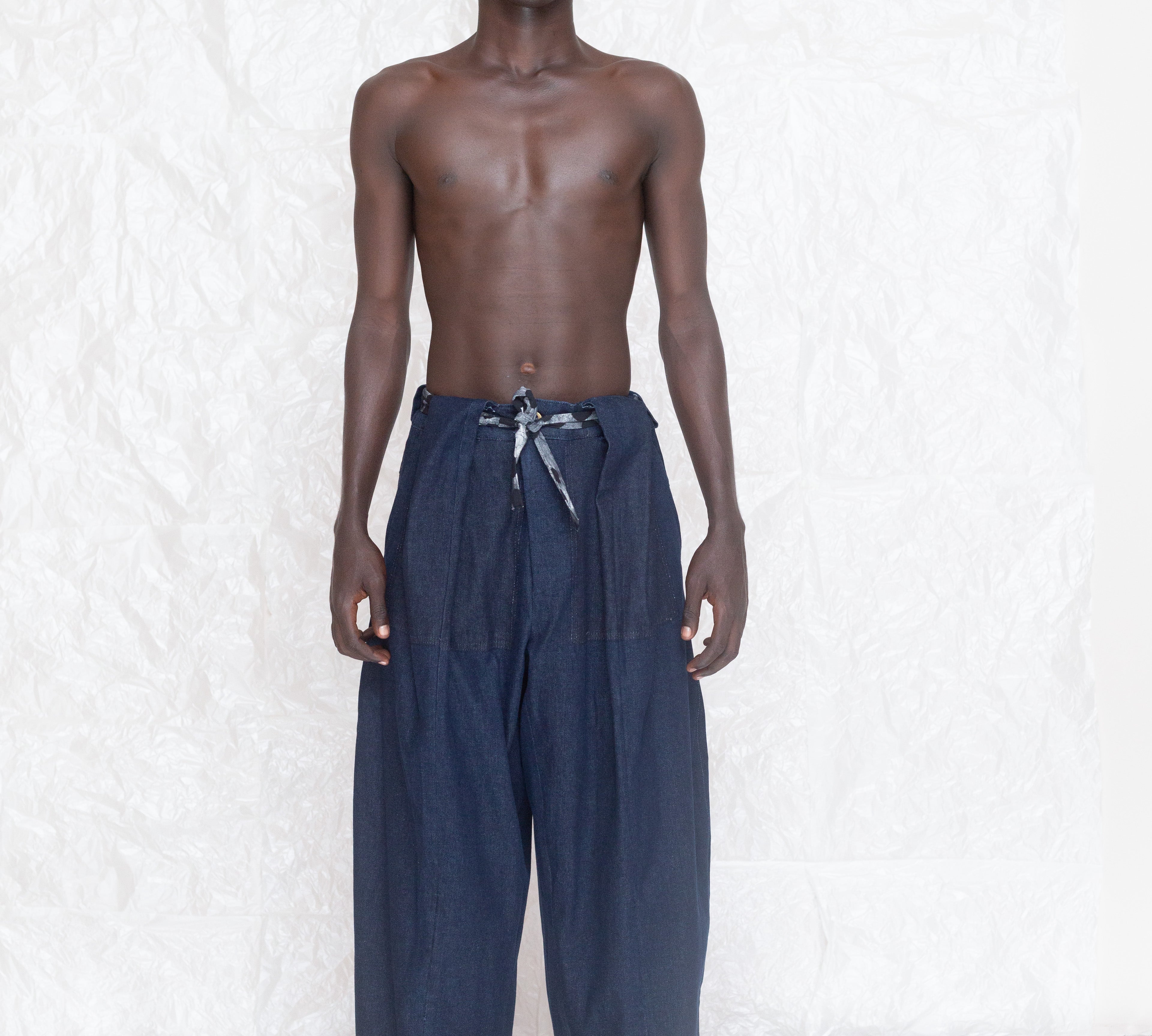OLOOH Upcycled Baggy Jeans with Tribal Motifs | ADJOAA