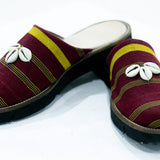 Cute-Saint Oke Lightweight Mules with deadstock leather and cowrie detailing